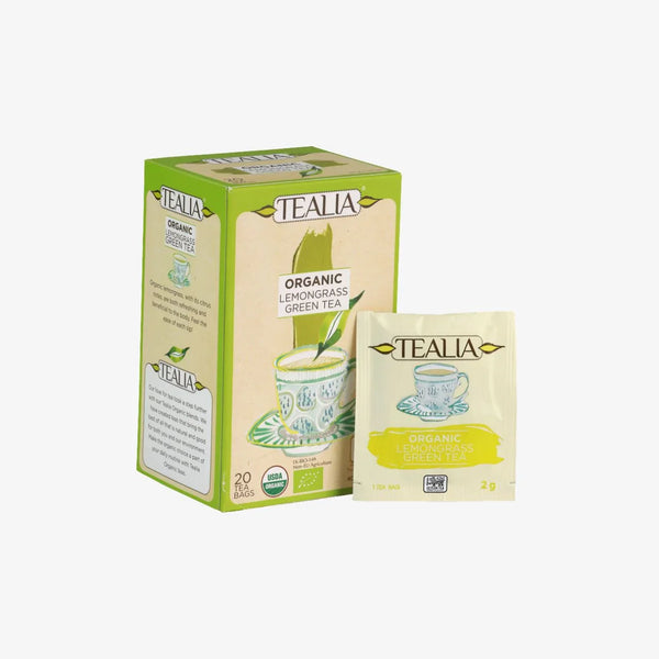 Box and sachet of organic lemongrass green tea with illustrated cup on packaging