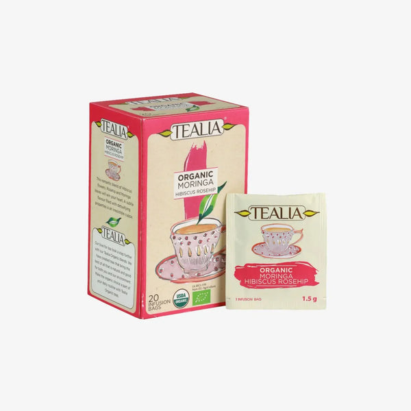 Organic moringa hibiscus rosehip tea box and single tea bag with teacup illustration