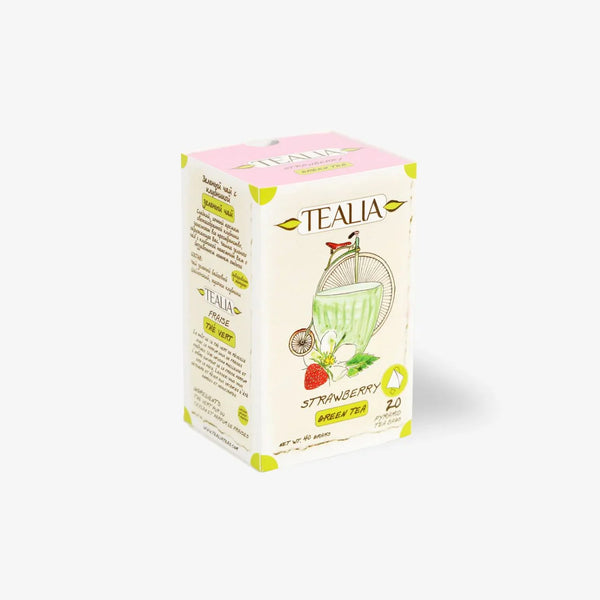Box of Tealia strawberry green tea with illustrated strawberries and tea leaves